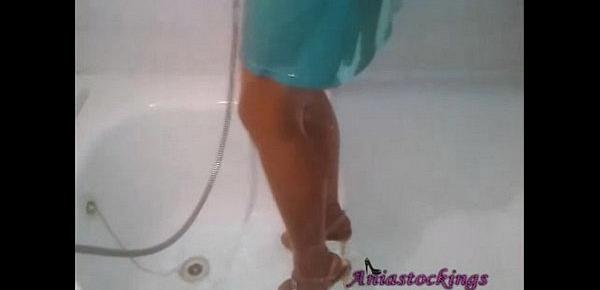  Nylon And Feet Passion A woman takes a shower in pantyhose